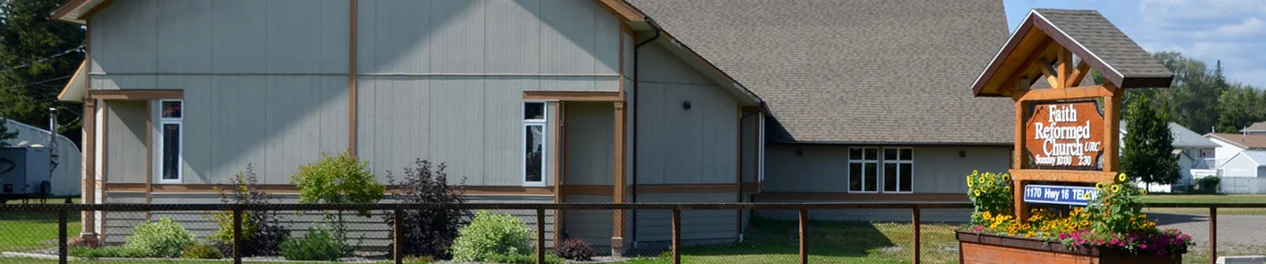 Faith Reformed Church building and welcome sign in Telkwa, BC